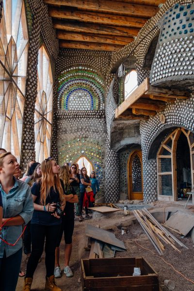 Photos of students at the The Greater World Earthship Community during the 2016 seminar Landscape and Memory in the American Southwest