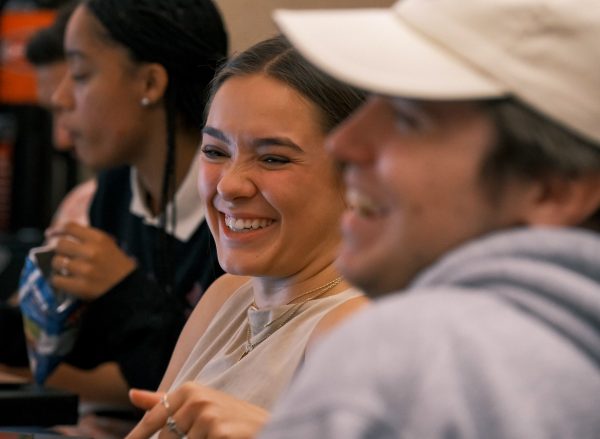 students laughing during class lecture