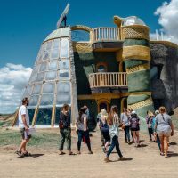 Photos of students at the The Greater World Earthship Community during the 2016 seminar Landscape and Memory in the American Southwest